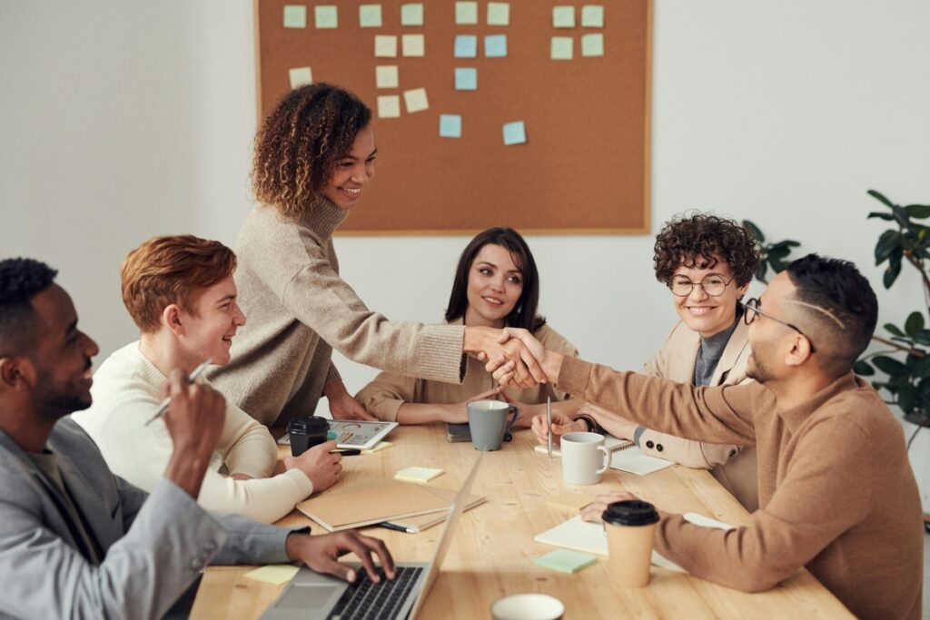 Group of People at a Board Room Table